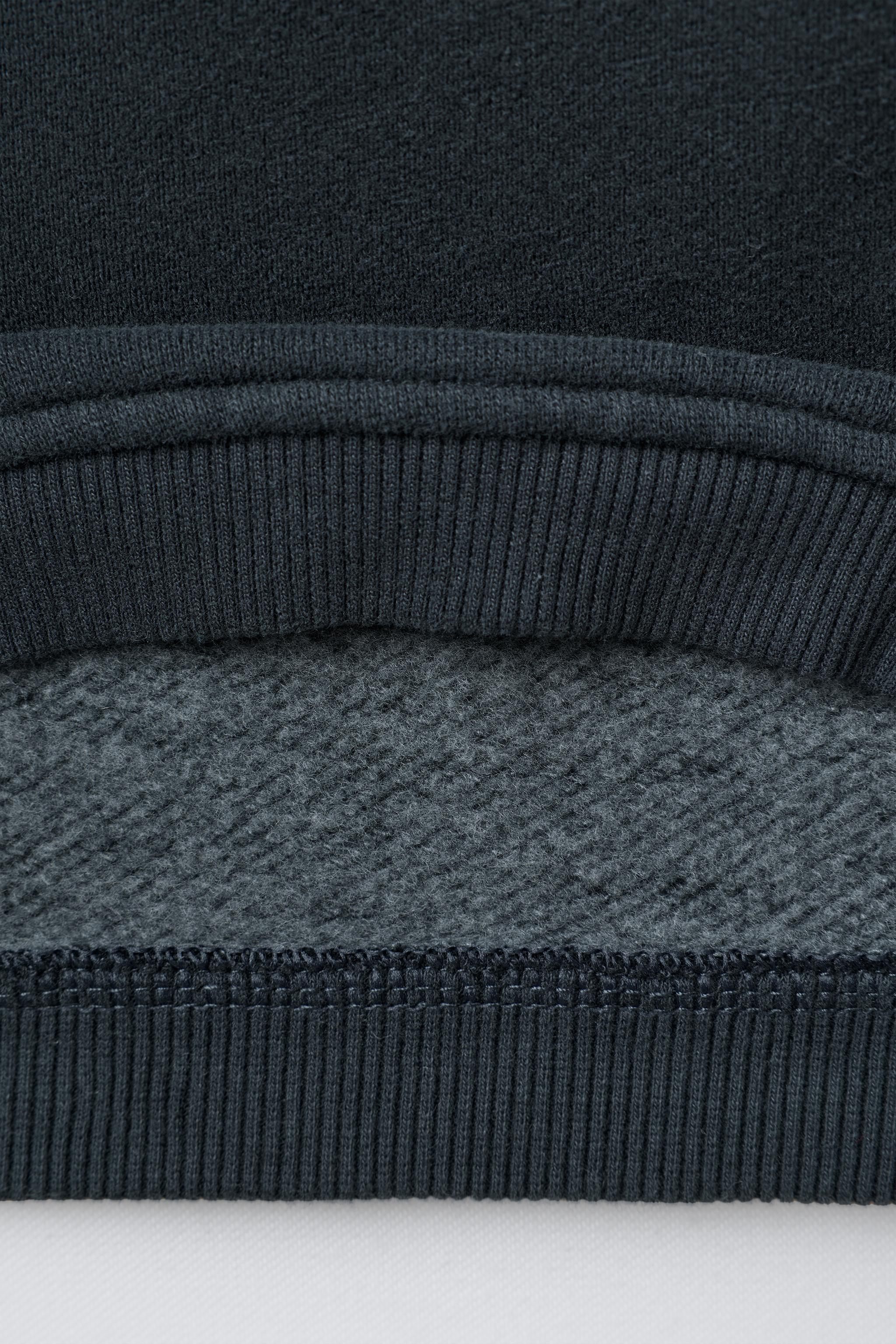 PENGUIN PRINT SWEATSHIRT